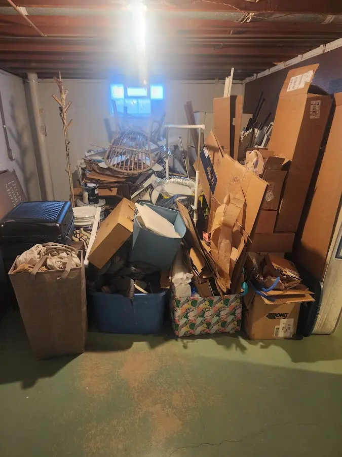 Roll-off dumpster container at job site for Yard Waste Dumpster Rental in Manhattan